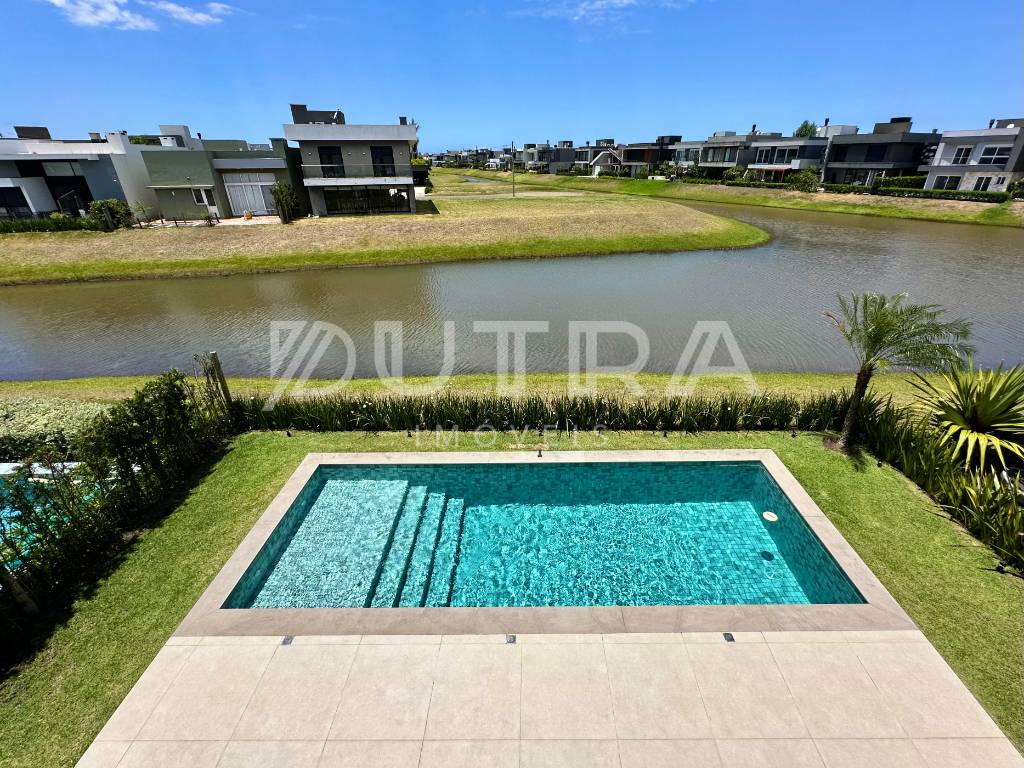 Casa em Condomínio 4 dormitórios para venda, parque Antártida em Capão da Canoa | Ref.: 4004